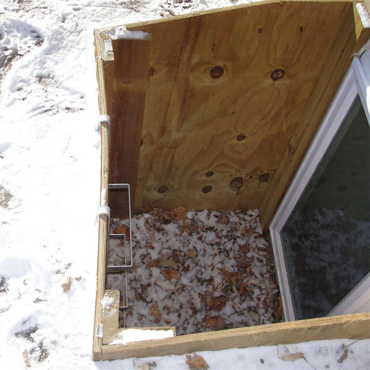 Plywood window well