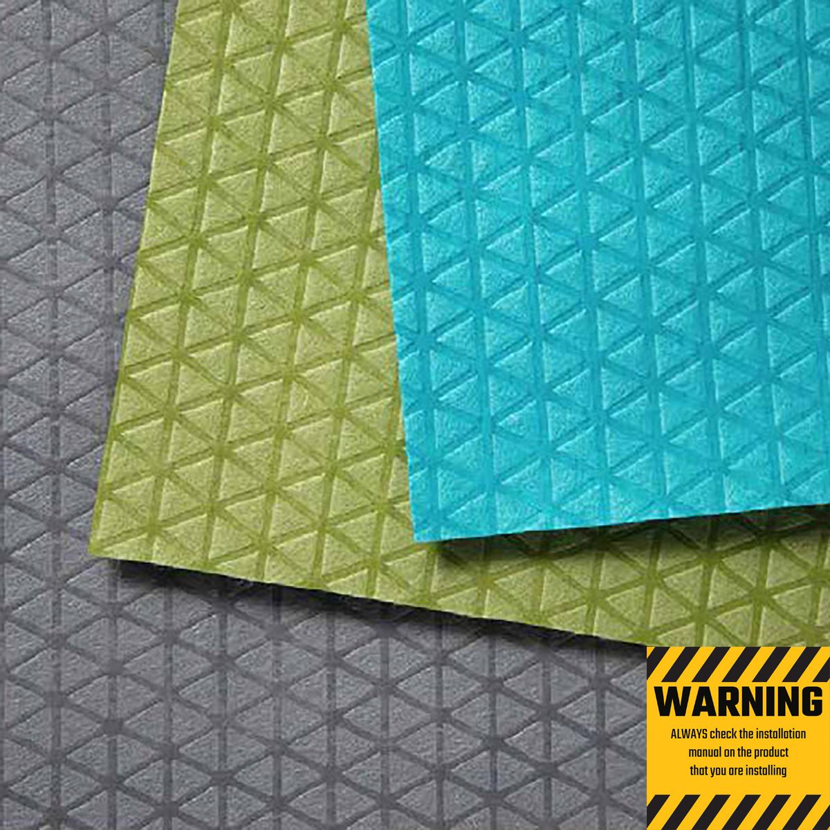 Three textured sheets in teal, green, and gray are stacked. A warning label in black and yellow at the bottom advises checking the installation manual.